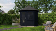 Black hexagonal garden building with single door, side windows. Viewed from front/right side. 