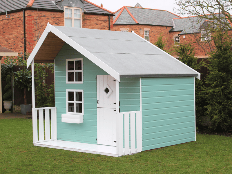 Children's playhouse painted in blue with white accents, viewed from the side. 
