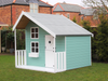 Children's playhouse painted in blue with white accents, viewed from the side. 