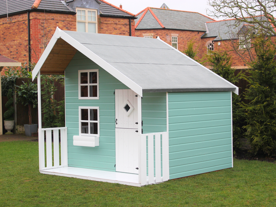 Children's playhouse painted in blue with white accents, viewed from the side. 