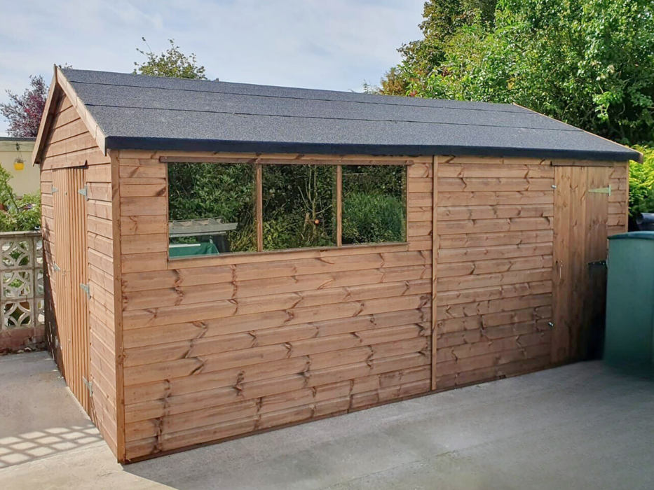 Apex Workshop with front double doors, three side windows, and a side door, viewed from the right