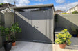 AvantGarde steel shed in a happy cusomter's garden, pictured in metallic quartz grey finish