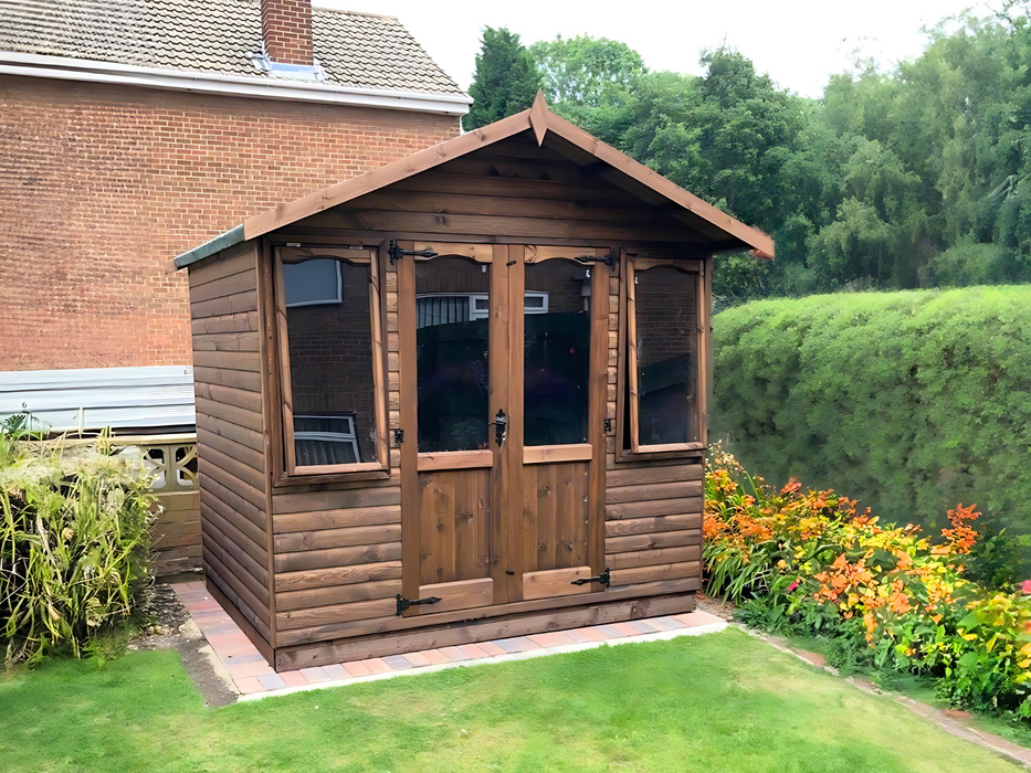 The Bamburgh Summerhouse with double doors and two opening side windows, viewed from the front 