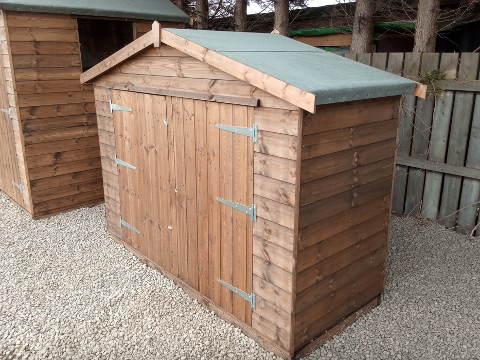 "The Bike Store" garden equipment and bike storage shed with double doors, viewed from the right