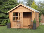 Wooden summerhouse with large bay window, double doors opened, viewed from the front. 