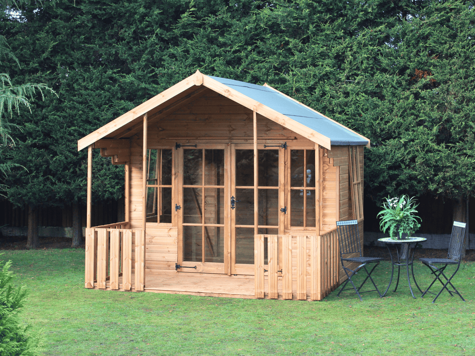 Wooden summerhouse with large double doors, tall windows, and a veranda / porch area. Viewed from the front. 