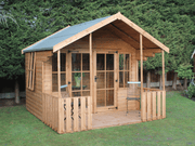 Wooden summerhouse with large double doors, porch area, side opening windows, viewed from the front/left side.
