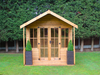 Classic wooden summerhouse with large double doors, viewed from the front. 