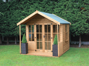 Classic wooden summerhouse with large double doors, side opening windows, viewed from front/right side. 