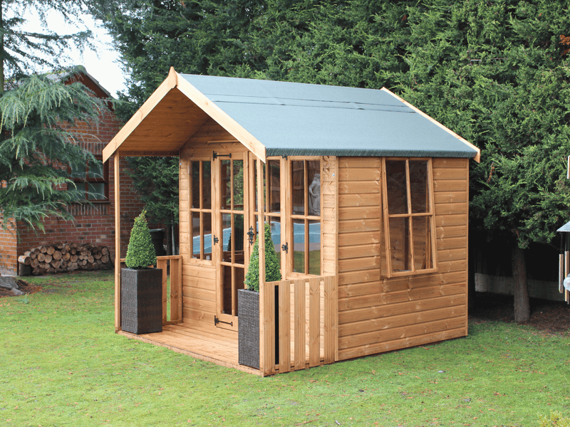 Classic wooden summerhouse with large double doors, side opening windows, viewed from the front/right side. 