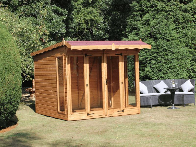 Wooden summerhouse with red roof tiles, large double doors, large front and side windows viewed from the left side. 