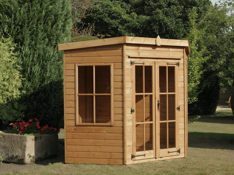 Wooden corner summerhouse with large double doors, large side windows, viewed from the left side. 
