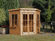 Wooden corner summerhouse with large double doors, side opening windows, viewed from the front. 