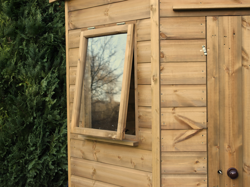 Close up of the side opening window on the left side of the corner shed. 