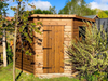 Corner Shed with a single door and two side windows, viewed from the front