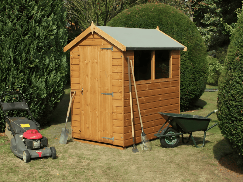 Classic wooden shed with apex style roof, single door at the front, 2 side windows. Viewed from the front/right side. 