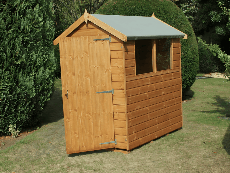 Classic wooden shed with apex style roof, single door, 2 side windows. Viewed from the front/right side. 