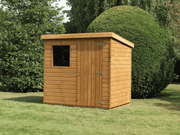 Classic wooden shed with pent style roof, single door at front, single window at front. Viewed from the front/right side. 