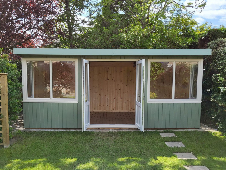 Deluxe Summerhouse / Office with open UPVC double doors and large corner windows, painted in a green finish and viewed from the front