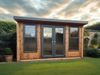 Deluxe Summerhouse / Office with UPVC double doors and two windows, in a natural timber finish and viewed from the front