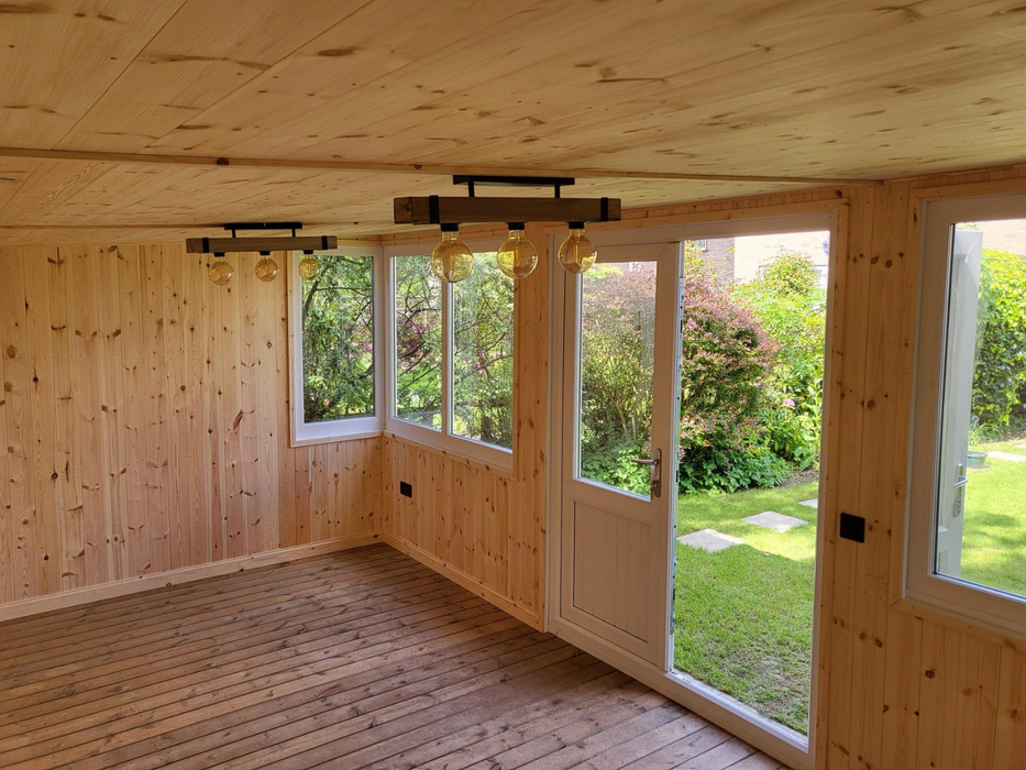 Internal view of the Deluxe Summerhouse / Office with UPVC double doors and large corner windows