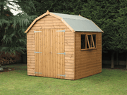 Wooden shed with pitched barn-style apex roof. Featuring double doors and side opening windows, viewed from the front/right side. 