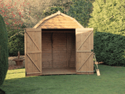 Wooden shed with pitched barn-style apex roof. Featuring open double doors showing the interior, viewed from the front.