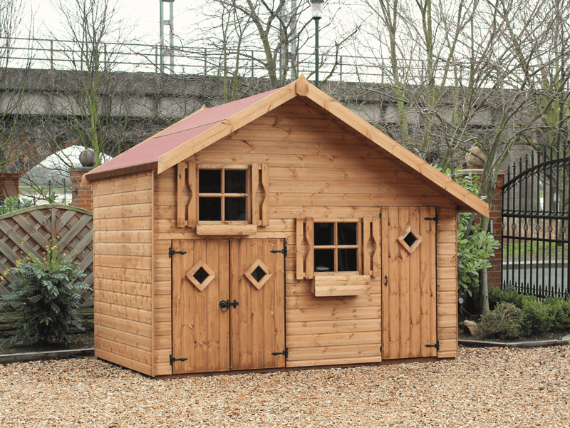 Large wooden children's playhouse with shorter double doors, taller single door, two acrylic windows, viewed from the front/left side. 