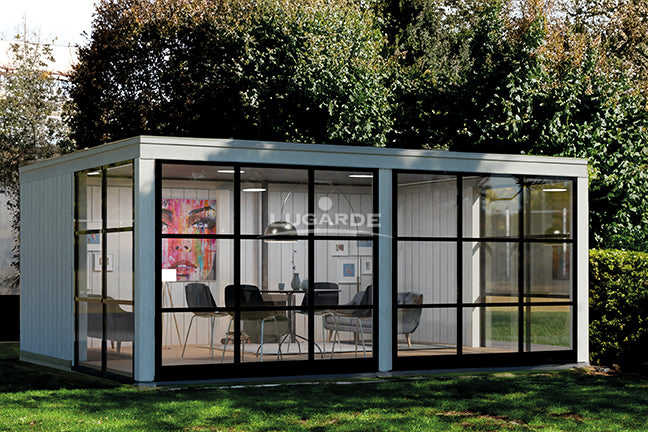 Large, white, wooden summerhouse with glass walls. Viewed from the front/left side.
