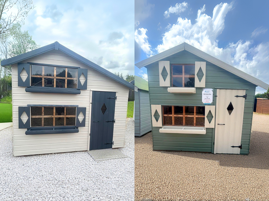 Side-by-side images of two Harrison's Den two-storey children's playhouses, one painted in white and blue, the other in green and white, both viewed from the front