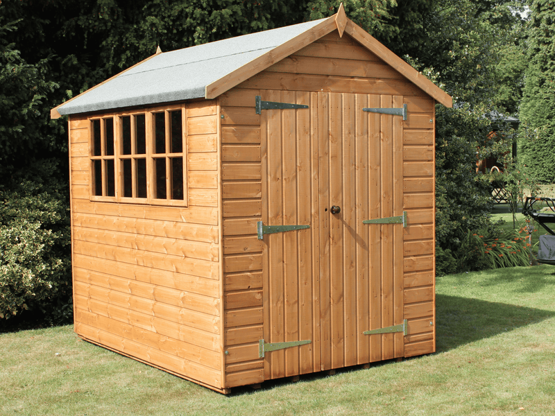 Heavy duty shed with apex roof, double doors and three side windows on left, viewed from front/left side. 
