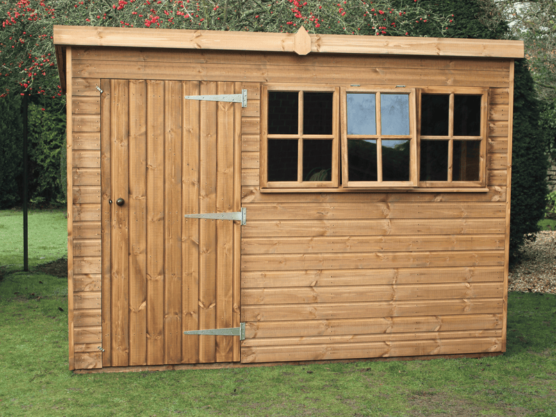 Heavy duty pent roof shed with single door, three front windows, viewed from the front. 