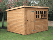 Heavy Duty shed with pent roof, single door, and front windows, viewed from the front/left side. 