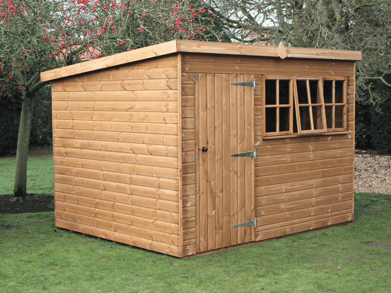 Heavy Duty shed with pent roof, single door, and front windows, viewed from the front/left side. 