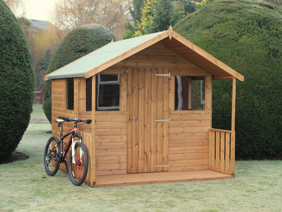 Wooden summerhouse with single door, and 4 surrounding windows, viewed from the front/left side. 