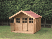 Wooden playhouse with red roof, side window, windows on either side of single door, viewed from front/right side. 