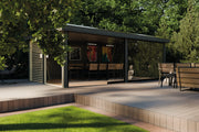 Large summerhouse with wooden + glass walls, slatted panels. Viewed from front/left side.