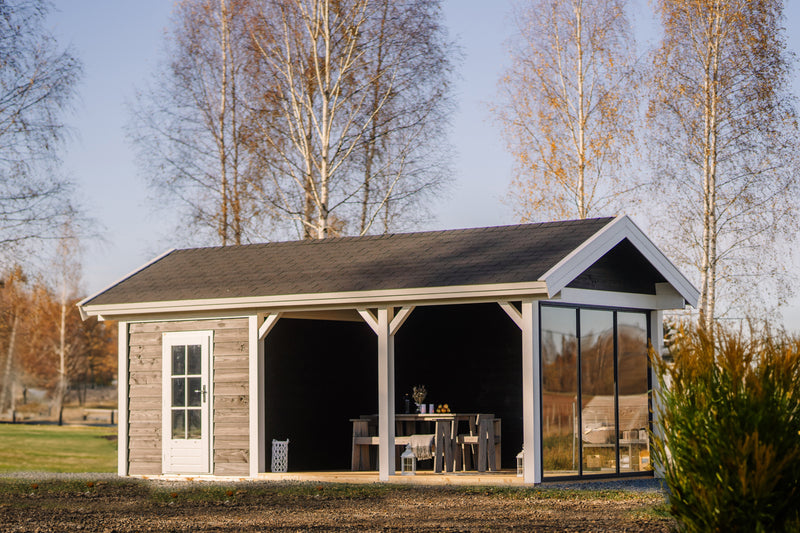 Wooden summerhouse with single door, canopy area on the right. Viewed from thr front/right side.