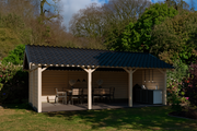Large wooden gazebo with apex-style roof, three walls. Viewed from the front. 