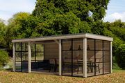 Large, wooden gazebo with glass walls. Viewed from front/right side.