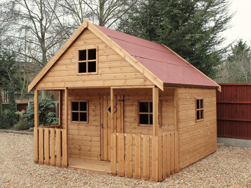 Large wooden playhouse with two levels, red roof, single door, multiple windows including a side window, viewed from front/right side. 