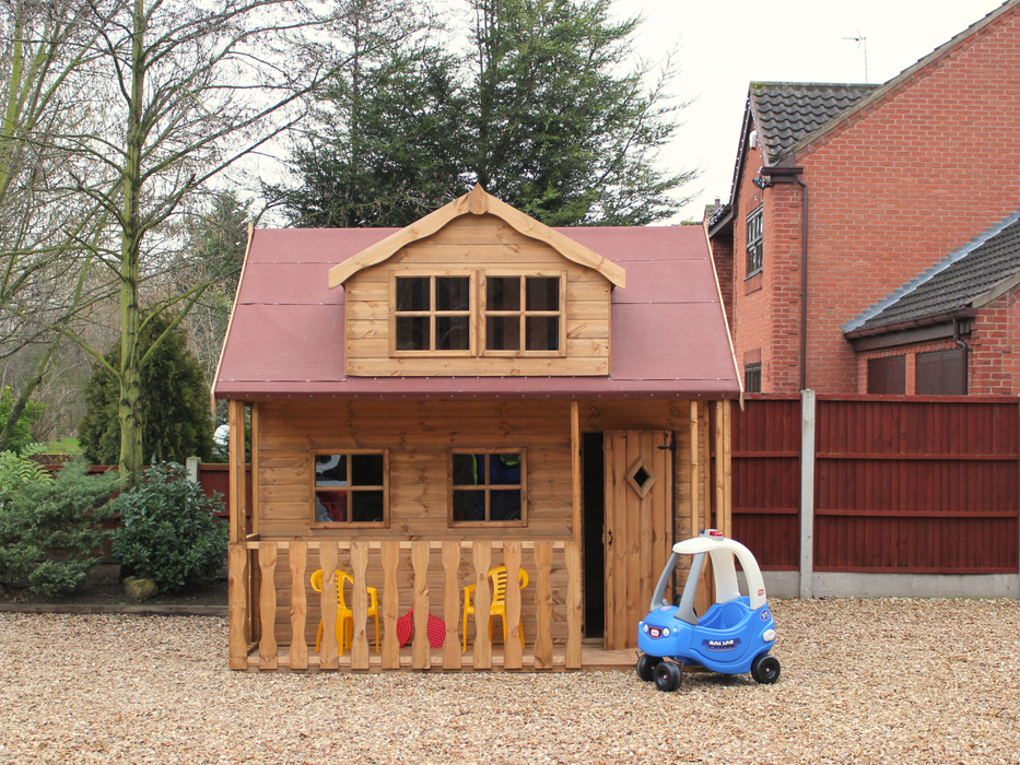 Wooden playhouse with red roof, 2 levels, single door, 4 front windows, viewed from the front. 