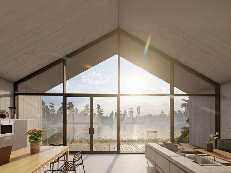 Interior view from the Maria residential log cabin, looking out at a lake through the front large glass wall