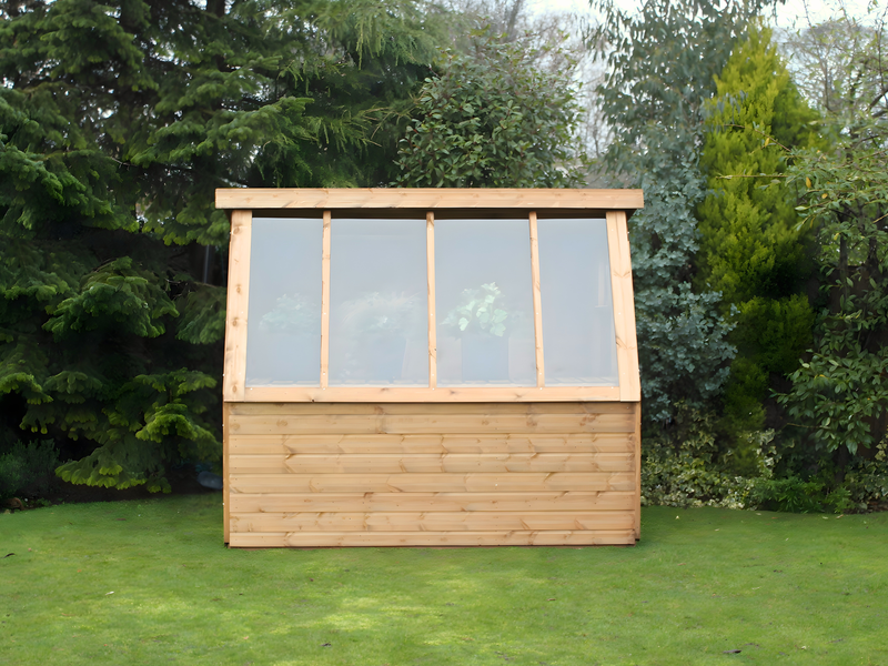 Wooden potting shed with long slanted windows. Viewed from the front. 