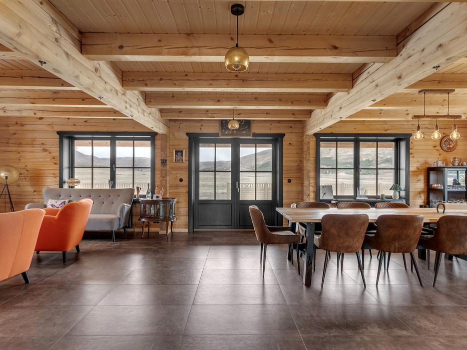 Interior view of the living / dining area in the Priit residential log cabin