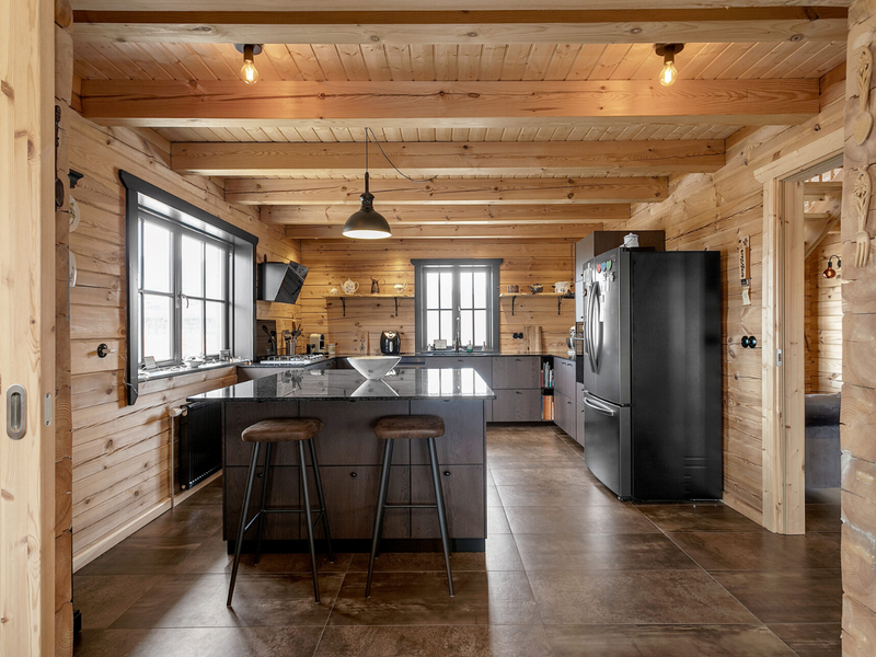 Interior view of the kitchen in the Priit residential log cabin