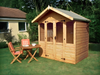 Wooden summerhouse with double doors and two windows on either side of door. Viewed from the front/right side. 