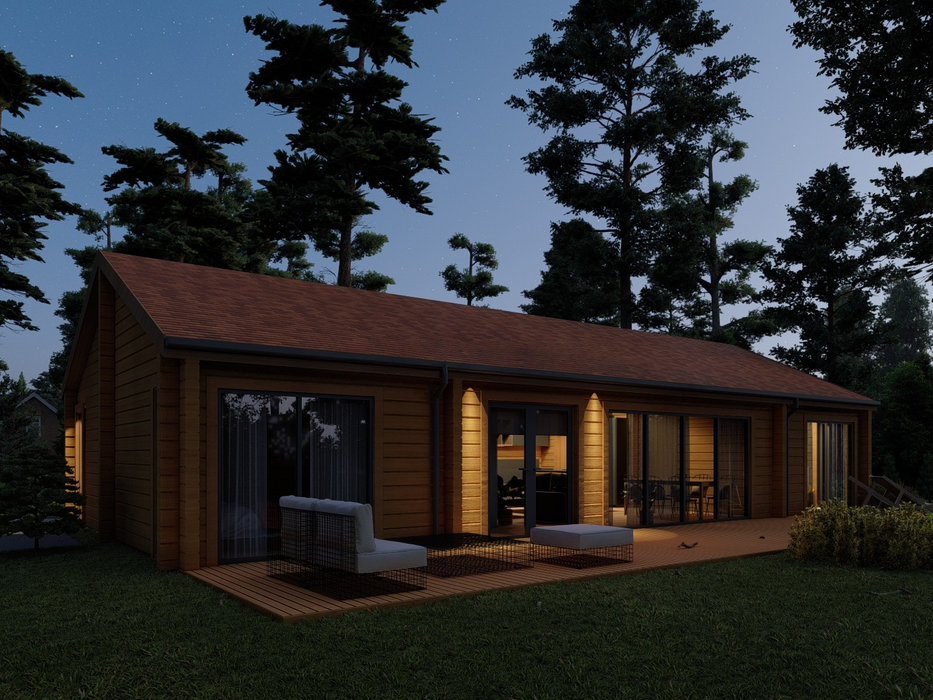 Richard residential log cabin at night, viewed from the front