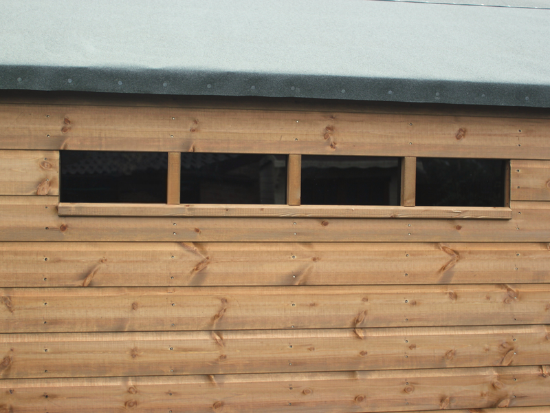 Close up of the security windows on the side of the wooden security pent shed. 