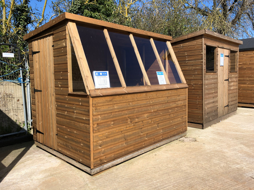 Solar Potting Shed in a natural timber finish, viewed from the right of the building